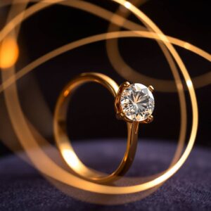 Gold ring with moissanite diamond, showcasing brilliance and modern design