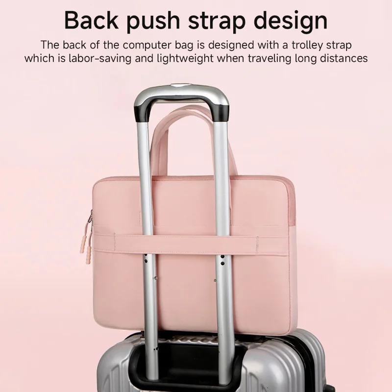 A pink laptop bag with a trolley strap is shown attached to a silver suitcase. The text on the image reads, "Back push strap design. The back of the computer bag is designed with a trolley strap which is labor-saving and lightweight when traveling long distances."