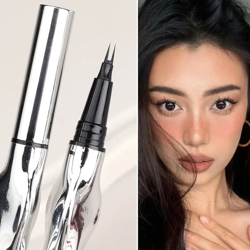 Close-up image of a silver and black eyeliner pen with a unique design. A woman with dark hair and makeup is shown in the background, showcasing the eyeliner's potential use.