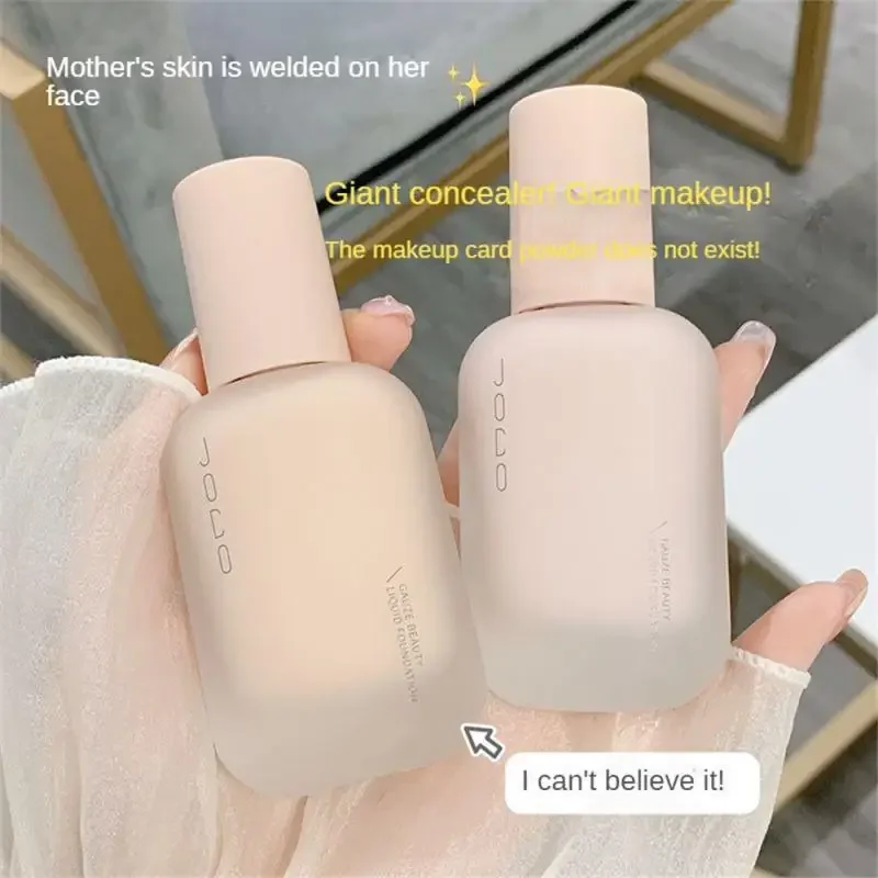 Two bottles of JOCO Gauze Beauty Liquid Foundation are shown in the image. The bottles are light pink and have a minimalist design. Text on the image says "Mother's skin is welded on her face", "Giant concealer Giant makeup!", "The makeup card powder does not exist!", and "I can't believe it!"