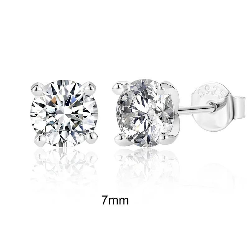 Pair of 7mm sterling silver stud earrings with cubic zirconia stones.