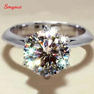 Close-up of a sparkling diamond solitaire ring on a white background.