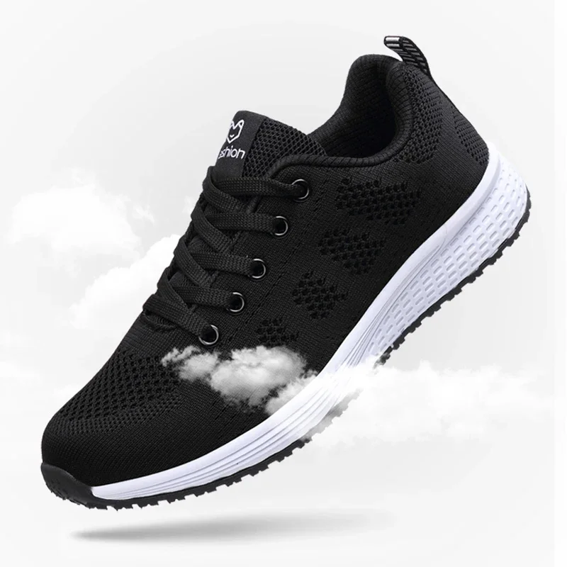 A black knit sneaker with a white sole is shown floating against a white background. The shoe is slightly angled and the laces are tied.