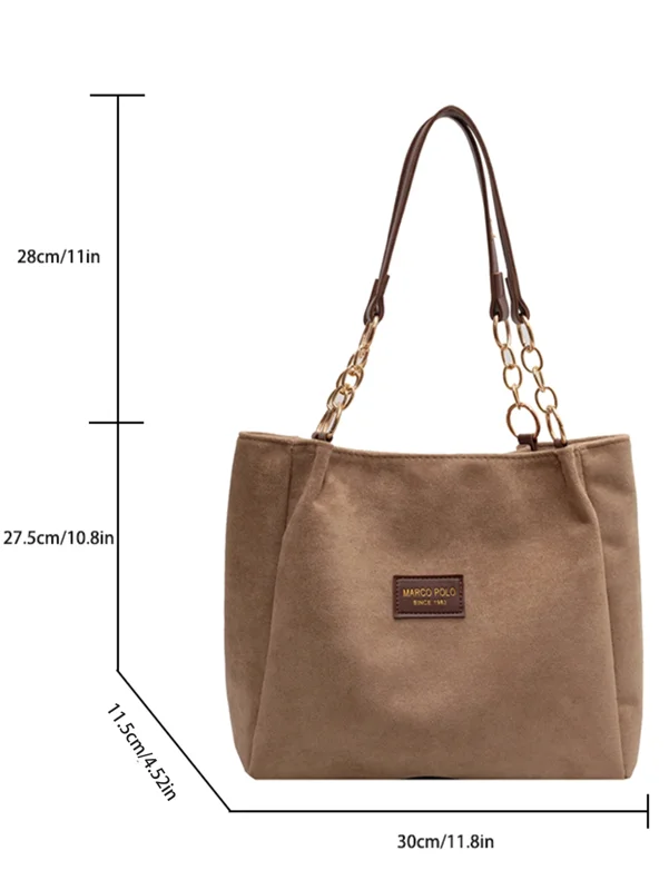 A taupe-colored tote bag with gold chain straps and a brown leather accent. The bag is shown with measurements in centimeters and inches.