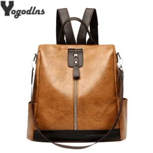 A light brown leather backpack with dark brown straps and accents. The backpack has a zipper closure and a small pocket on the front.