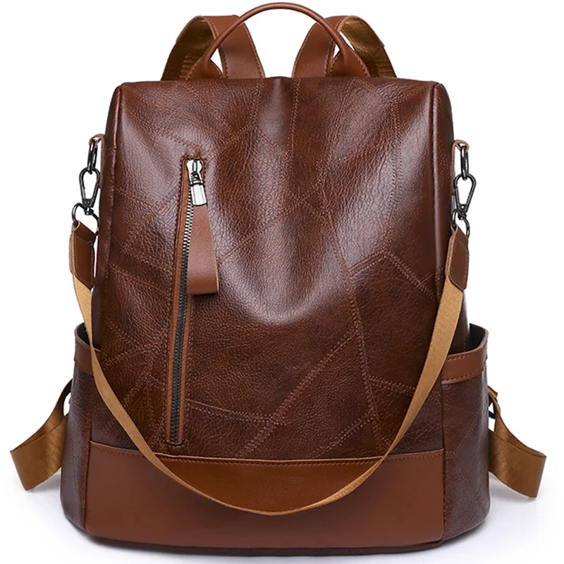 A brown leather backpack with a geometric pattern. The backpack has a zipper closure and two shoulder straps. It is a stylish and practical backpack for everyday use.